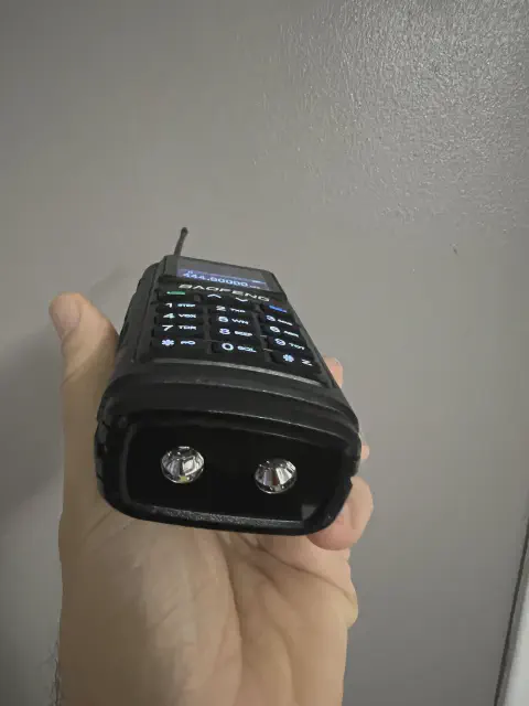 baofeng btech uv 17r plus bottom view showing two led flashlight turned off black textured body