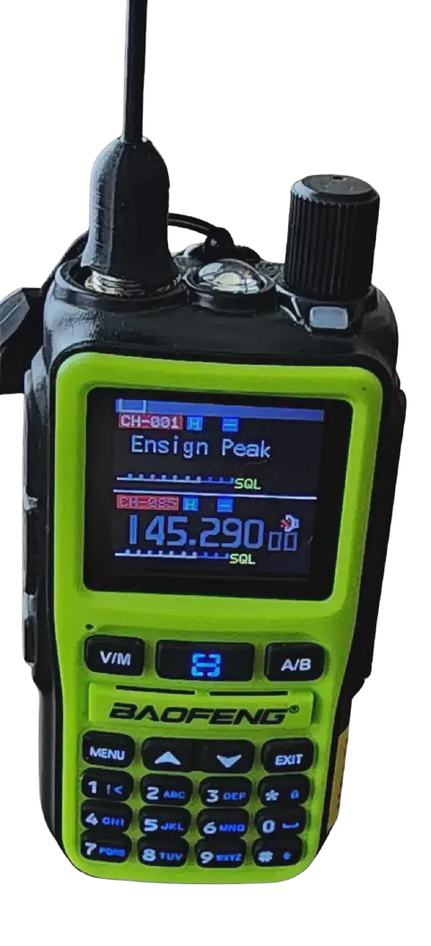 baofeng btech uv 5r mini front view with signal stick antenna attached green smooth and black textured body single control knob lcd display numeric keypad control buttons