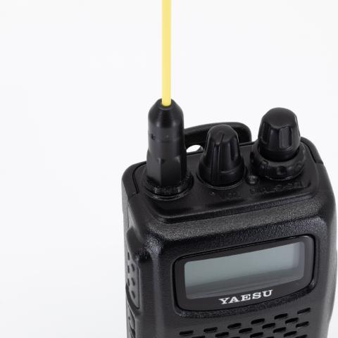 yaesu ft 60 top view with yellow antenna attached using 3d printed spacer black textured body two control knobs lcd display